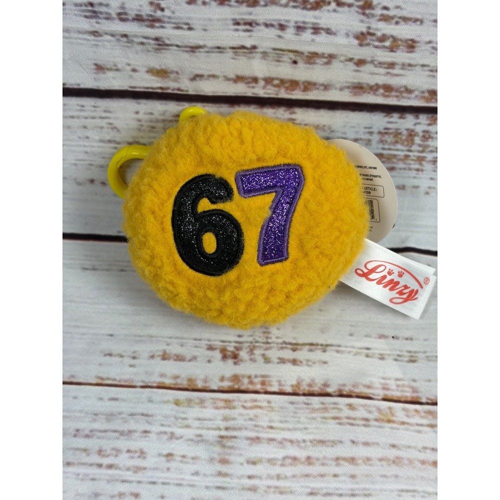 Linzy Plush Backpack Clip Yellow Fuzzy Number 67 Glitter Charm 086-13-4099